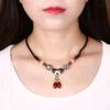 GEMCHIC Collana da Donna Stile Etnico con Fiore in Vetro per la Clavicola Corda Intrecciata Fatta a Mano Choker Gioiello con Ciondolo Vintage di Perline