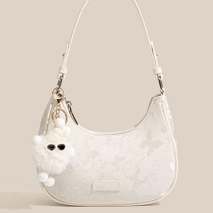 

Трендовая женская сумка оригинального дизайна сумка-полумесяц 2025 новая нишевая сумка для通勤 высокого класса сумка под мышкой сумка-мессенджер на плечо