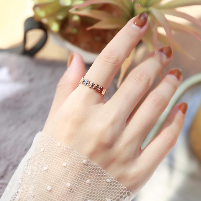 Korean Style Gold-Plated Titanium Steel Hollow Flower Ring for Women
