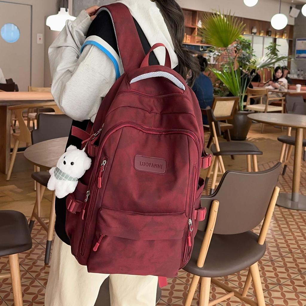 School bag Female and male primary school students Large capacity backpack Junior high school students High school students Lightweight