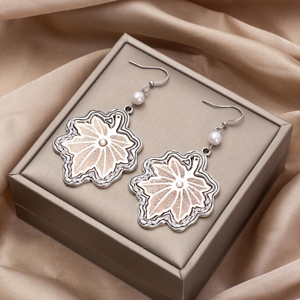 

Retro Two-Tone Leaf Earrings with Electroplated Computer Chip Design