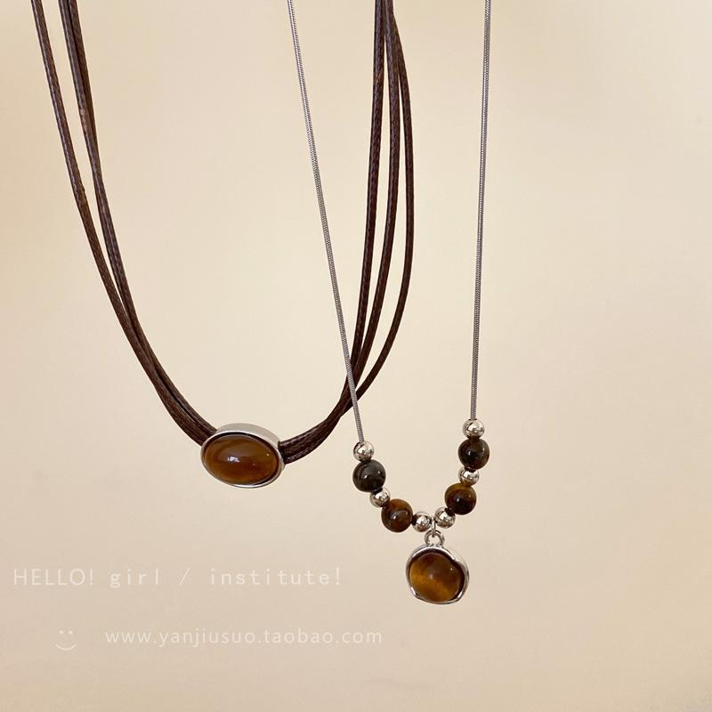 

Vintage leather tiger s eye necklace women s Chinese layered choker niche necklace versatile temperament clavicle chain accessory