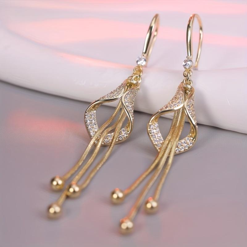 Eleganckie kolczyki z kryształowymi frędzlami, długie kolczyki z drapowanego stopu ze sztucznymi cyrkoniami, miedziane sztyfty