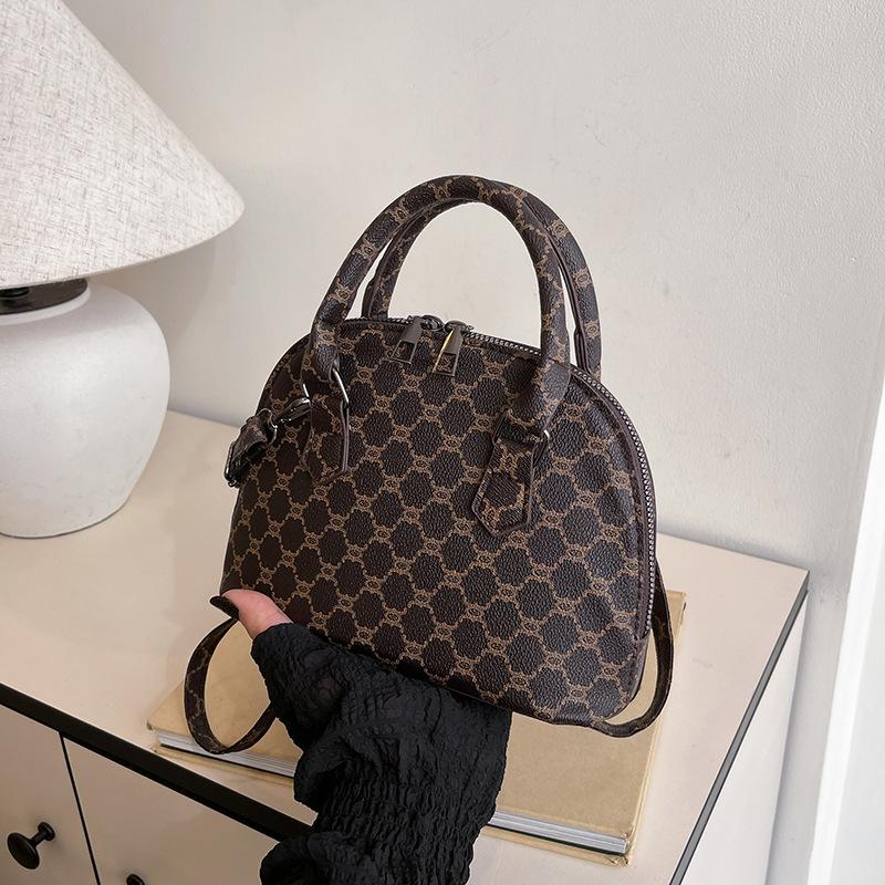 

Сумка-ракушка контрастного цвета 2025 новая тенденция ретро-принта женская наплечная сумка-мессенджер простая повседневная сумка под мышкой тренд чёрный