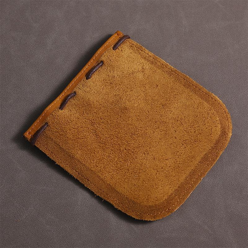 Cowhide Coin Purse: Retro Gift and Auspicious Blessing Bag for Men and Women with Creative Drawstring Design.
