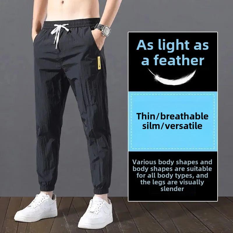 2023 Men's Korean-Style Ice Silk Casual Pants, Quick-Drying, Trendy, Loose-Fit Nine-Point Sports Pants for Summer.