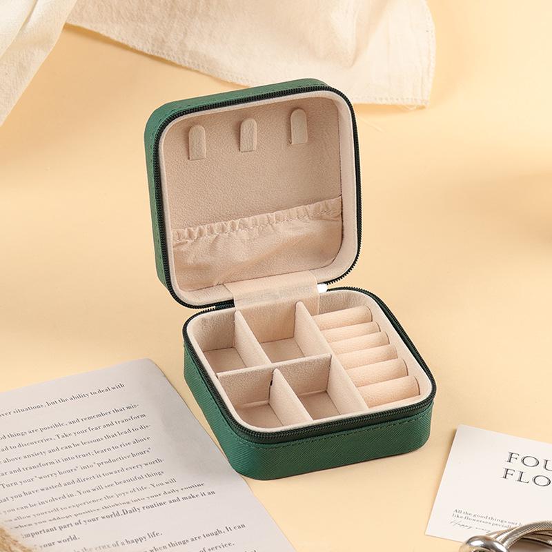 

Компактна дорожня коробка для зберігання ювелірних виробів з візерунком у вигляді хреста - Портативний мішечок на блискавці для сережок і кілець 10x10x5 cm темно-зелений колір