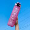 Gradient Large Capacity Sports Water Bottle with Scale, Portable Rope, and Bouncing Straw.