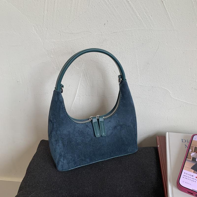 Retro fashion dumpling bag women 2025 new bag high sense light luxury niche commuting single shoulder cross hand bag