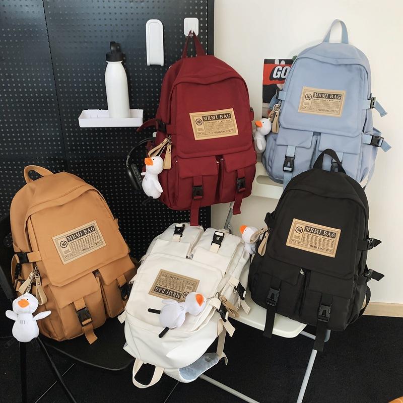 Stream Backpack Boys and Girls Large Capacity Casual Bag High Junior High School Student Burden Reduction Student Backpack