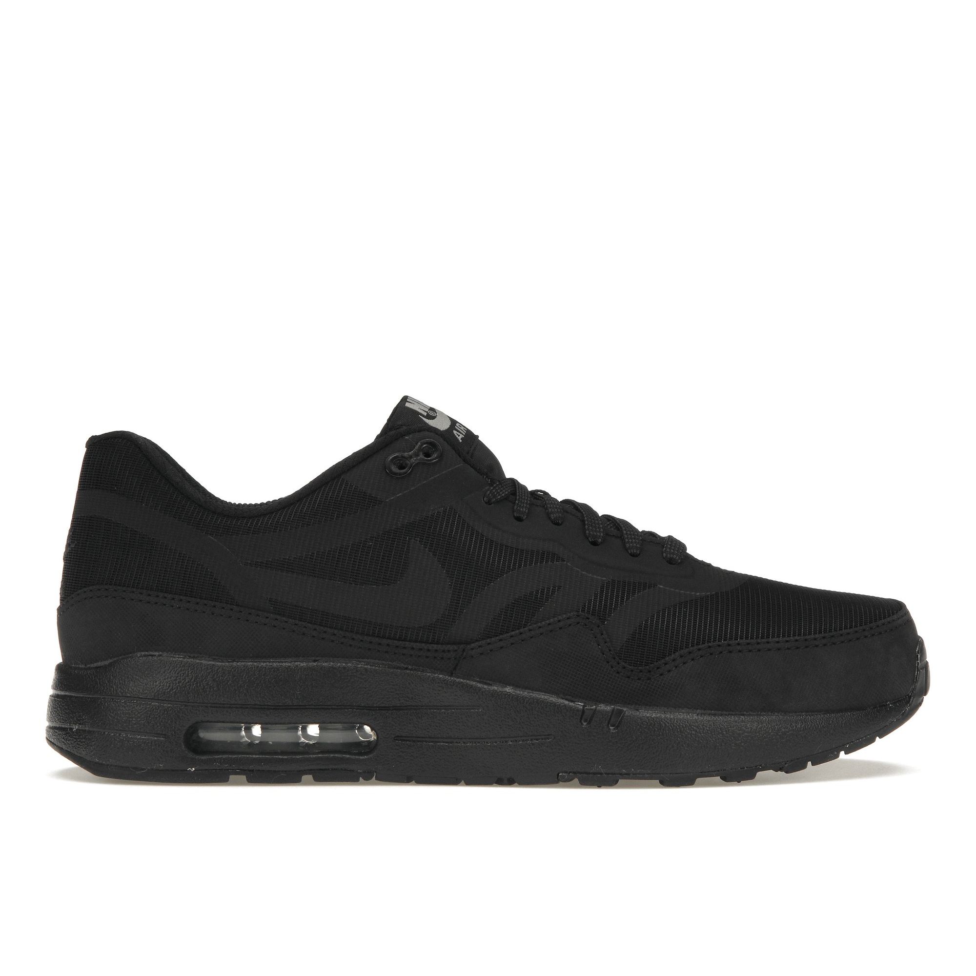 

Кроссовки унисекс Nike Air Max 1 Comfort Premium Tape Reflective Pack черный серебристый антрацит 599514-002