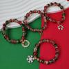 Christmas Diamond Santa & Snowflake Glass Bracelet: Stylish & Versatile Holiday Accessory.