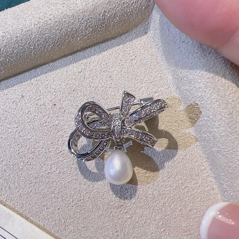 Elegant Pearl Bow Brooch and Cardigan Pin