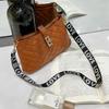 Embroidered rhombus buckle shoulder messenger women's bag, a new versatile light luxury Kelly bag