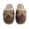 Winter women's velvet cotton slippers wear flat-bottomed couple's non-slip bow decorative wool slippers