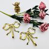 LUOZZY 2Pcs Bow Hook Bowknot Wall Hook Bow Hooks for Wall Multi-Purpose Hanging Brass Hooks for Coat Hat Towel Home Bedroom Supplies