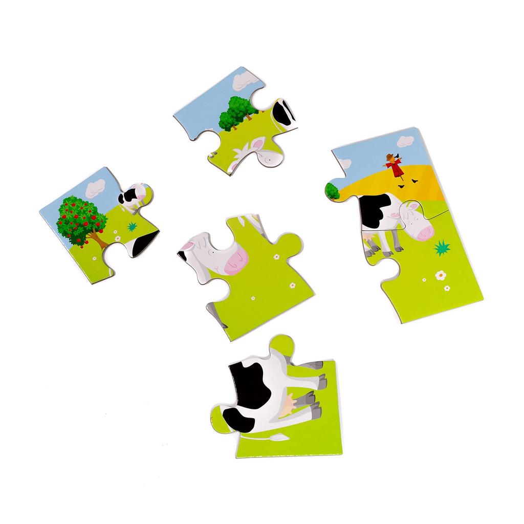 Kinder erstellen ein Puzzle mit Nutztieren (Packung mit 4)