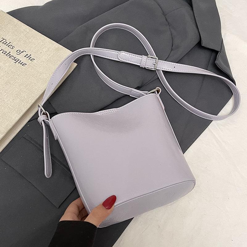 Wholesale Hot Sale Korean Simple Solid Color High-end Bucket Bag Fashionable Versatile Small Fresh Commuter Messenger Mother Bag