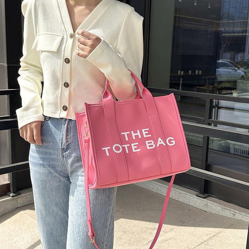 New women's bag women's new solid color pu letter tote bag simple casual messenger large capacity portable