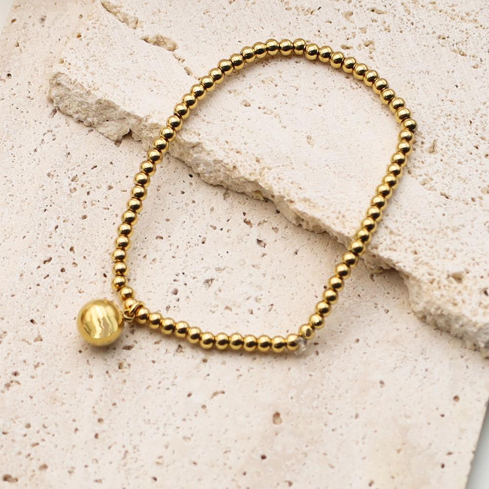 Fashion 18K Gold Elastic Rope Round Bead Titanium Steel Bracelet Niche High-End Hand Jewelry Does Not Fade