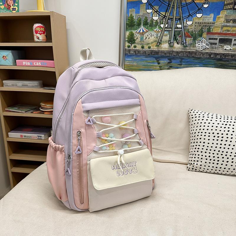 

Small fresh contrasting color backpack cute girl Korean version junior high school campus backpack primary school students new lightweight schoolbag