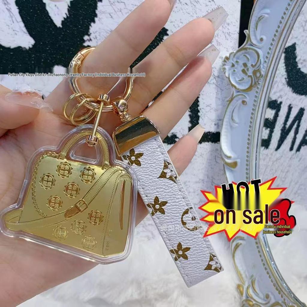 Goldene Taschenschlüsselanhänger: 20mg Reines Gold - Verspricht Reichtum, Frieden und Schönheit. Perfekt als Handy-Anhänger oder Auto-Ornament.