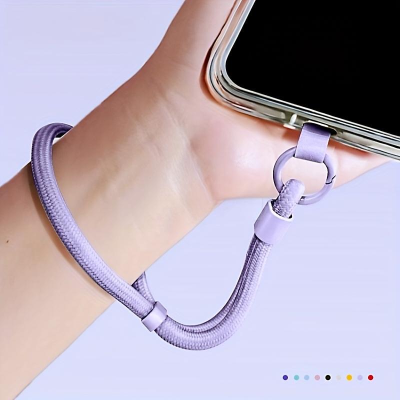 Universal phone wrist strap featuring anti-theft self-locking buckle. Durable anti-drop design, great for outdoor activities.
