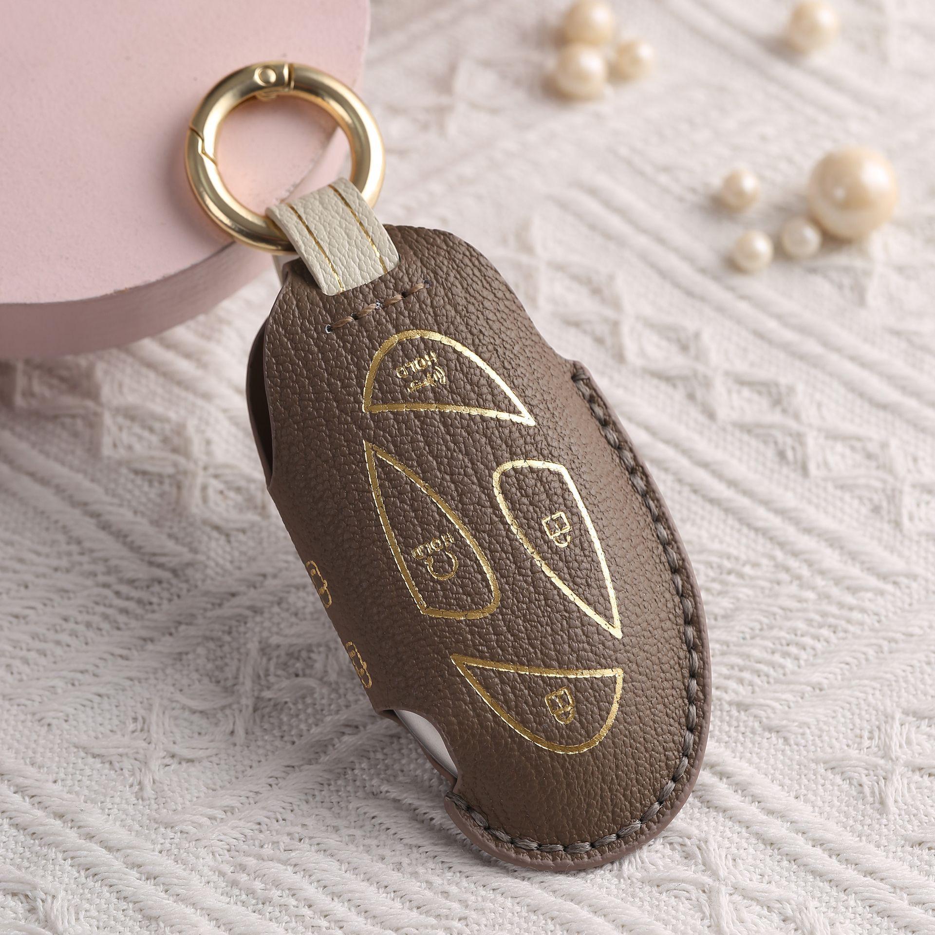 

Customized leather key cover, suitable for modern car key cover, pure hand-stitched cowhide high-end key protection bag коричневий