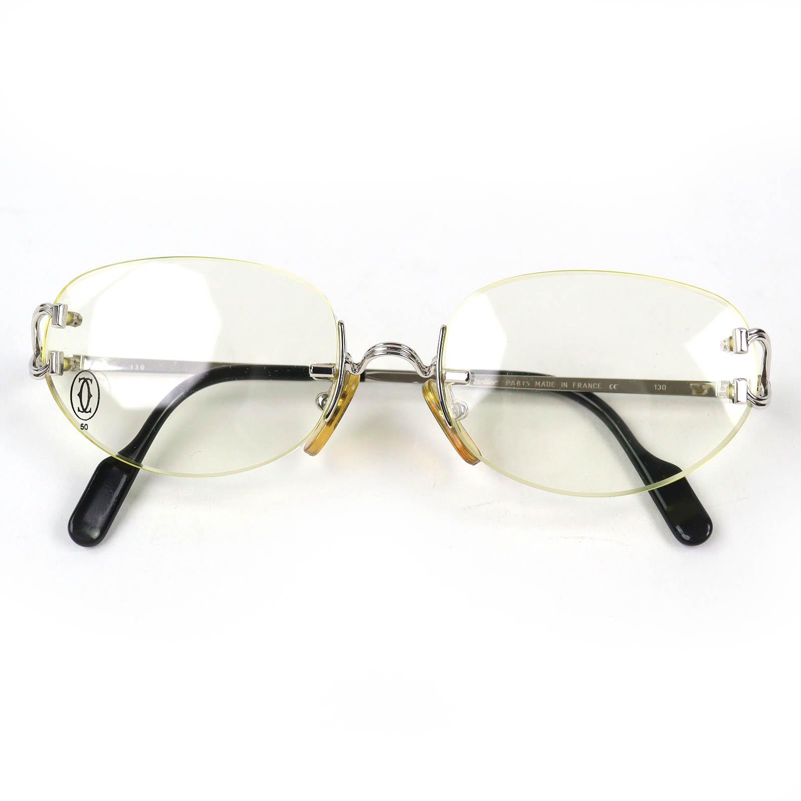 

Great Cartier Glasses Trinity Two-Point Rimless Silver mens Used