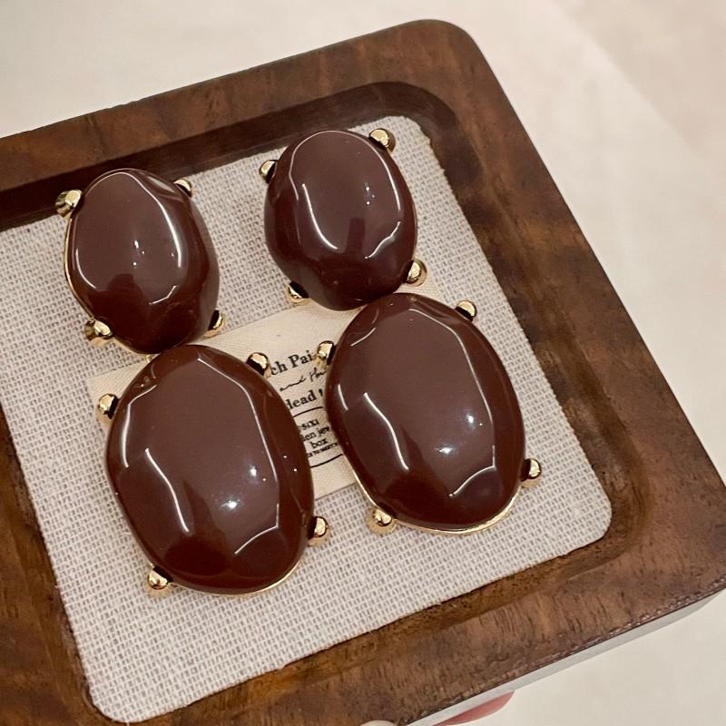 

Concave-Convex Oval Gemstone Resin Earrings: Vintage Luxury Style for Women.