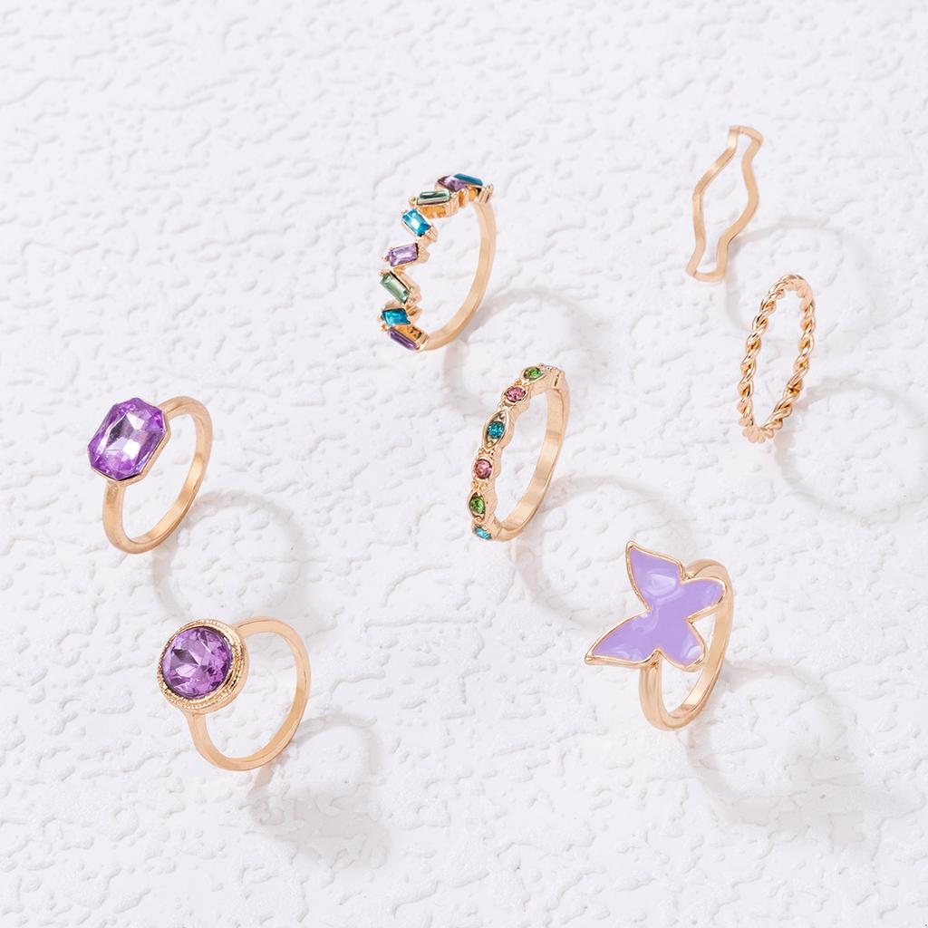 European and American new dripping butterfly imitation gemstone and diamond ring set Geometric twist ring seven-piece set