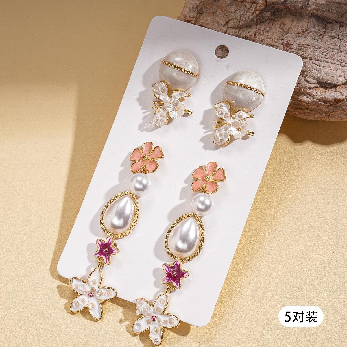 

Ten-piece set of diamond-set imitation pearl oil drop flower water drop silver needle earrings elegant retro earrings