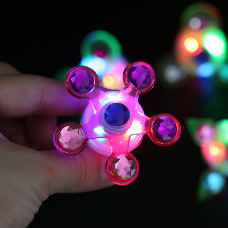 Glow-in-the-dark klein speelgoed creatieve nieuwe vingerpunt draaitol ring armband leuk klein cadeau