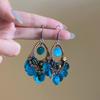 Retro ethnic style round hollow earrings Bohemian temperament elegant earrings niche fashion light luxury earrings women