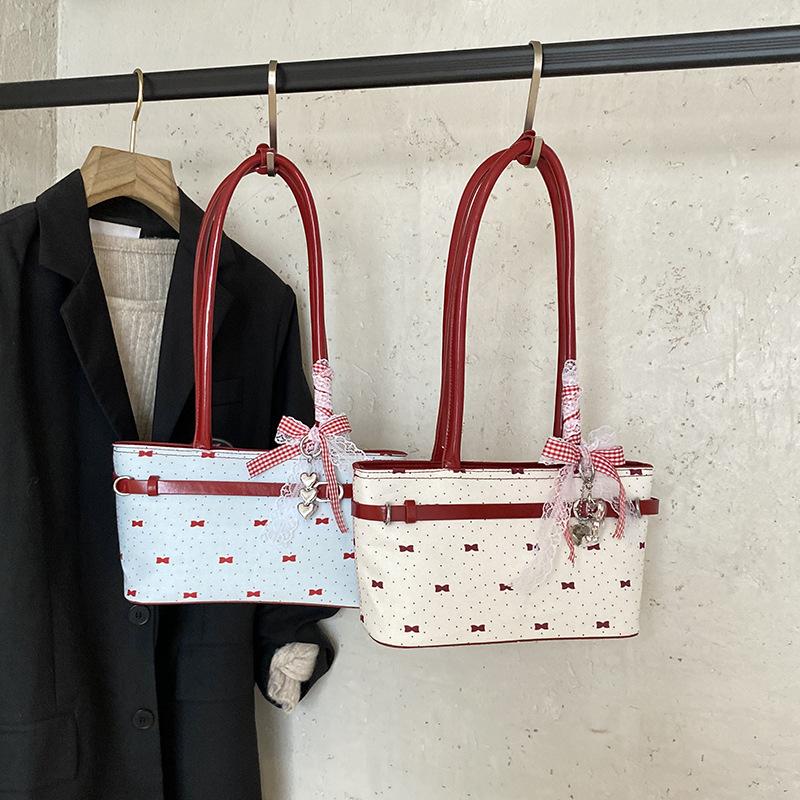 Été super feu rose nœud sac oreiller portable sac pour femme 2025 nouveau sac à bandoulière haut de gamme style ballet