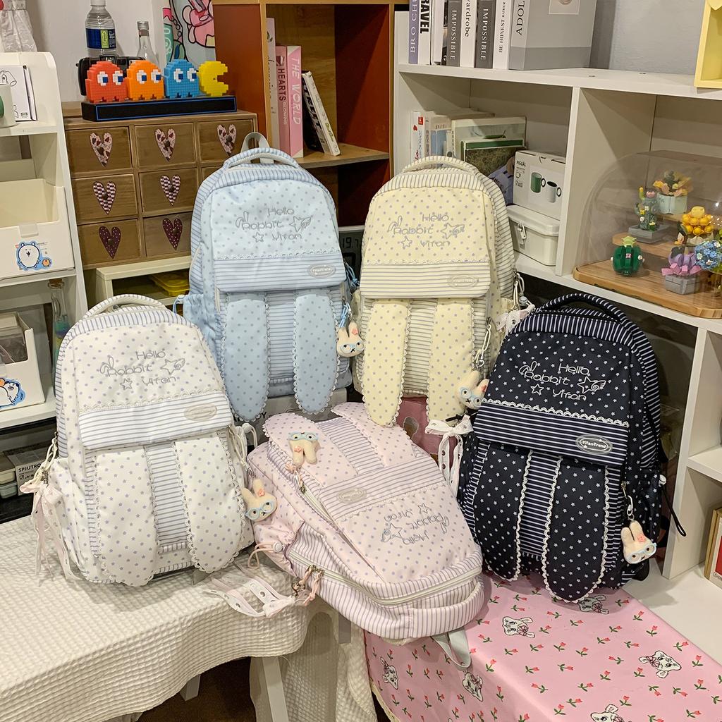 School bag: Sea salt blue vertical stripe rabbit ear backpack, star-studded backpack for middle and high school students, girls' casual travel lace
