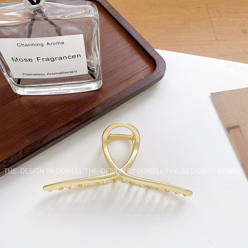 

Большая универсальная заколка-краб для волос для женщин, украшенная стильными геометрическими элементами в цветах розового золота и белого. Gold Yellow