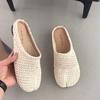 Korean version of woven cool slippers for women to wear one pedal casual round head flat bottom empty Mill shoes comfortable bag head half drag