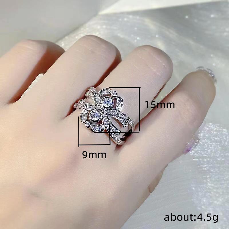 Cao Shi Europäischer & Amerikanischer Retro Floral Diamantring - Damen Symmetrisches Kreuz Finger Design
