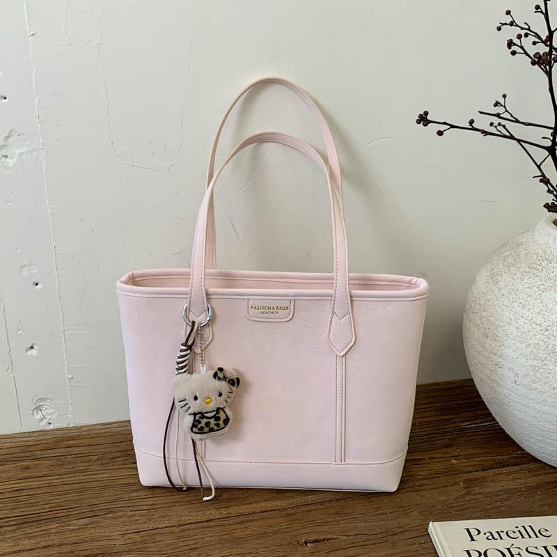 Lässige Pendlertasche, Großvolumig, Modische und stilvolle Unterarmtasche, Retro und trendige Einzelschultertasche With pendant rosa