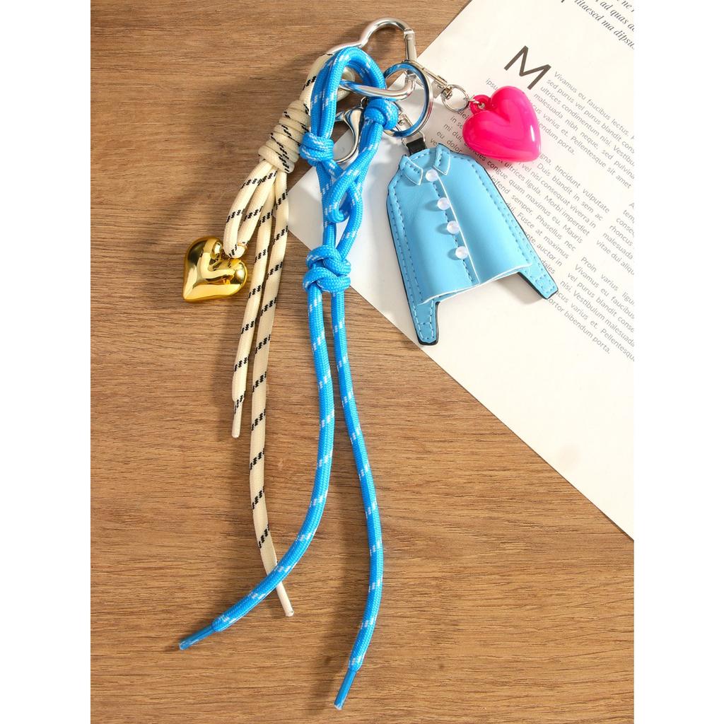 It is the same niche design PU blue shirt pendant keychain love braided rope versatile bag pendant accessories.