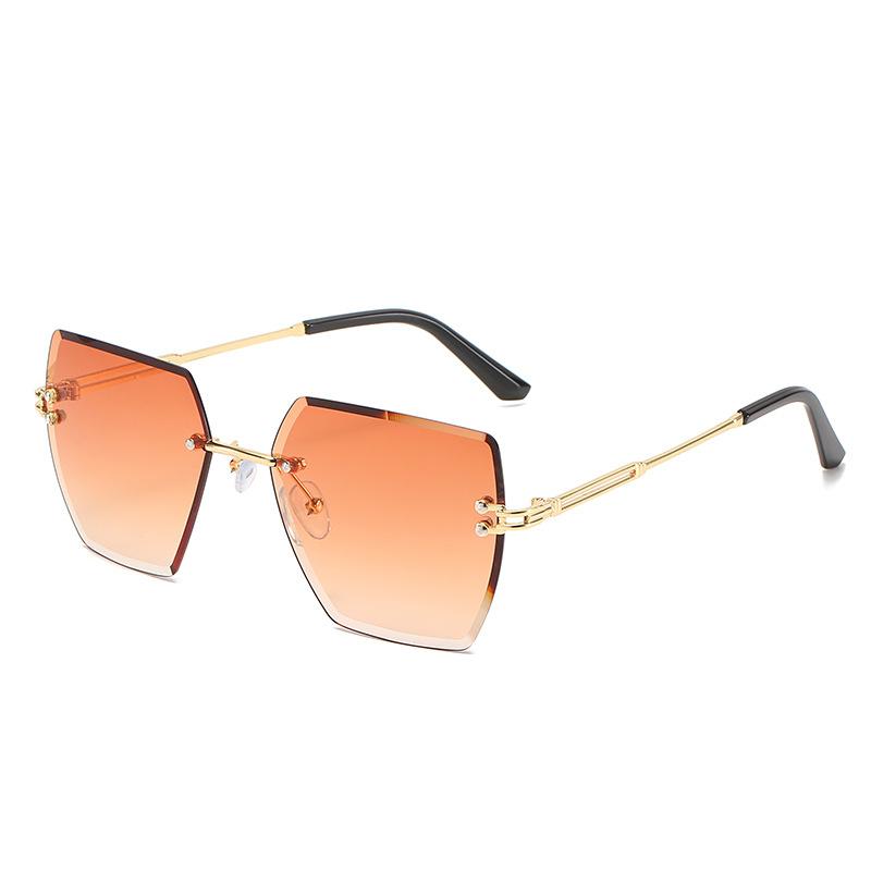 

Солнцезащитные очки с отделкой оправы Металлическая безободковая оправа Модные солнцезащитные очки с УФ-защитой Женские hot model