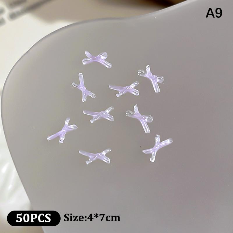 50Pcs Ice Transparent Color Bowknots Resin Nail Art Decorations 3D Mini Cute Bows Nail Charms For Diy Nails Accessories