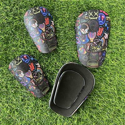 1 Paire Mini Protège-Tibias en Éponge Eva Résistants à l'Usure Absorbant les Chocs Protecteur de Jambe de Football Protège-Tibias d'Entraînement de Football