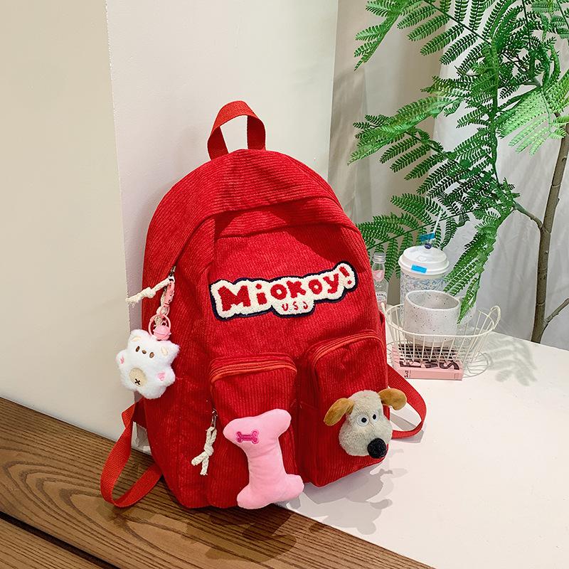

Large capacity simple solid color backpack junior high school student backpack boy schoolbag female college student красный