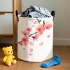 Single-piece 2D Flat-printed Laundry Basket with Pink Cherry Blossom Pattern, Made of Polyester Fiber. Suitable for Simple Home Storage In the Living 