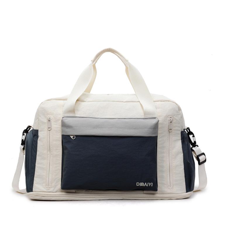 Fashion travel bag, large capacity, women's portable and light business trip duffel bag, men's expanded messenger sports storage fitness bag