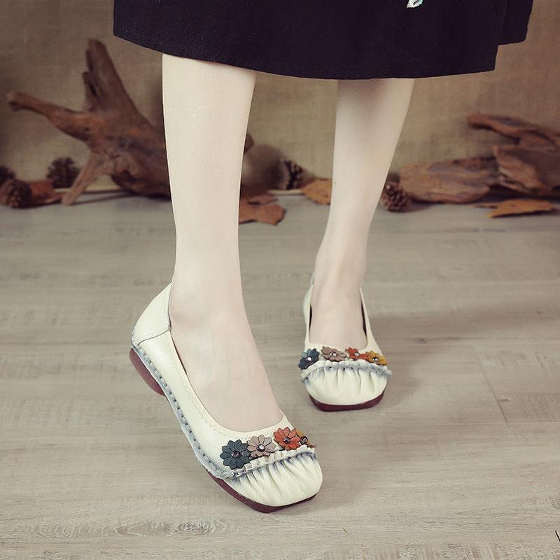 Summer new casual flat-bottomed breathable women's shoes leather hollow single shoes women's hole shoes soft sole