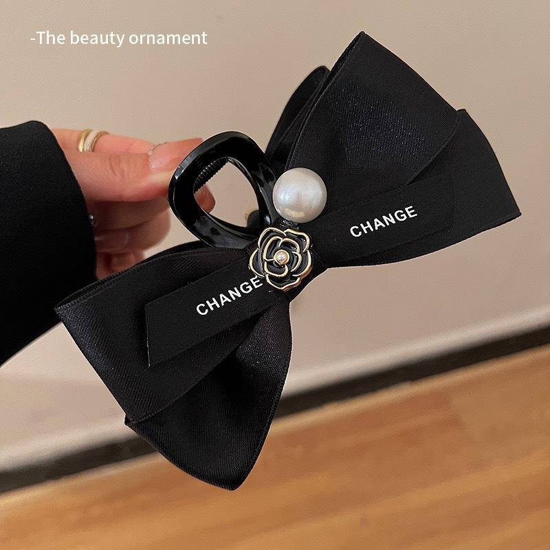 

1pc chic style pearl camellia bow hair clip for women, suitable for back of head bun hairstyle, hair fixing, shark clip