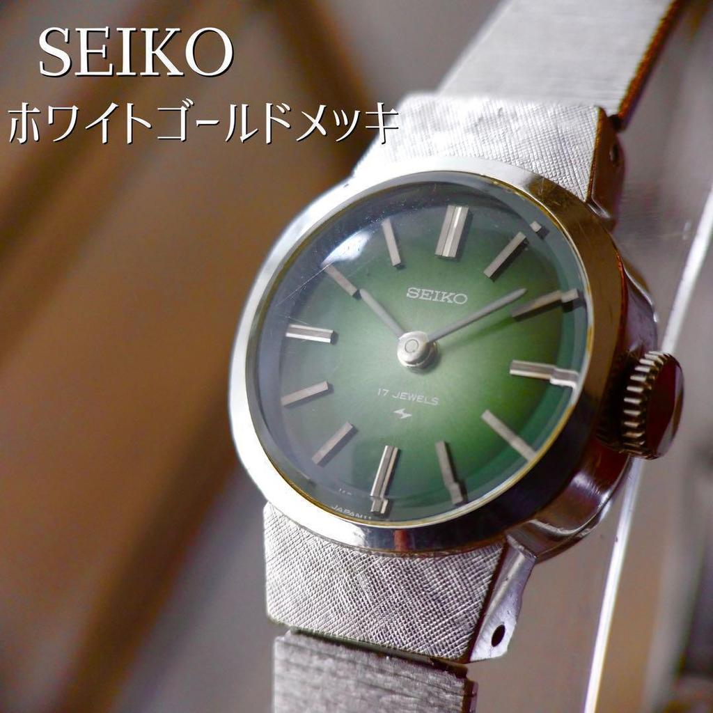 [USED] Seiko antique hand-wound wristwatch in excellent working condition, gold-plated, green, and silver.